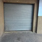 Maatskappy 1 beeld DOOR CLINIC Steel Garage Doors in Pretoria GP