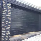 Maatskappy 3 beeld DOOR CLINIC Steel Garage Doors in Pretoria GP